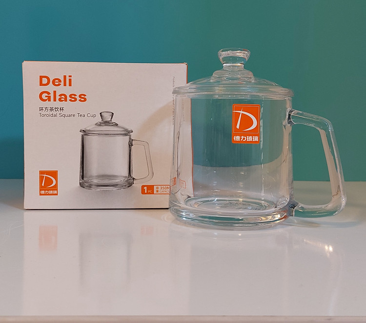لیوان دمنوش شیشهای دربدار Deli Glass مدل Toroidal | ظرفیت ۳۵۰ میلیلیتر